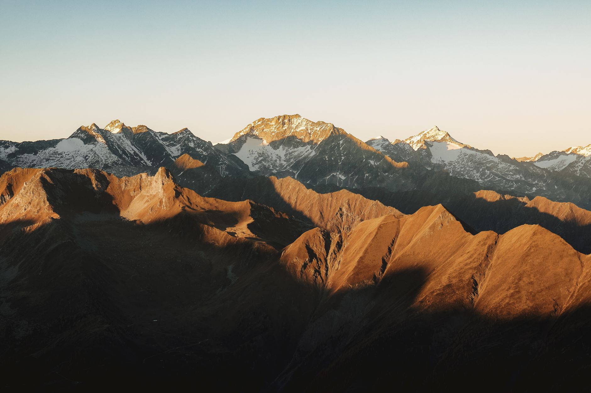 Mountain peak touched by morning golden hour